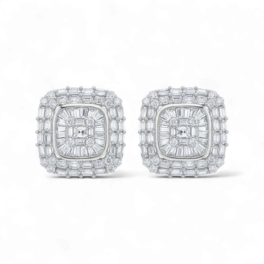 Pair of diamond earrings on a white background