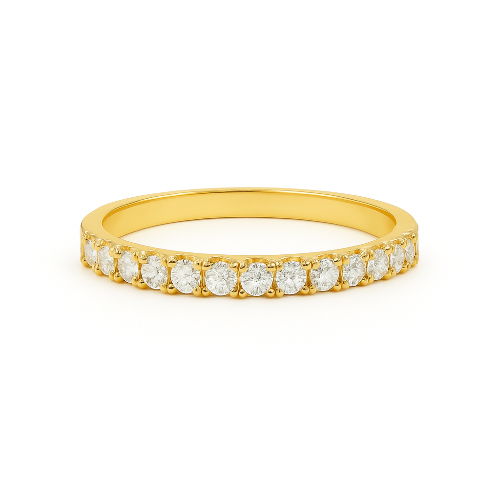 Gold ring with small diamonds on a white background