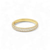 Gold ring with embedded diamonds on a white background