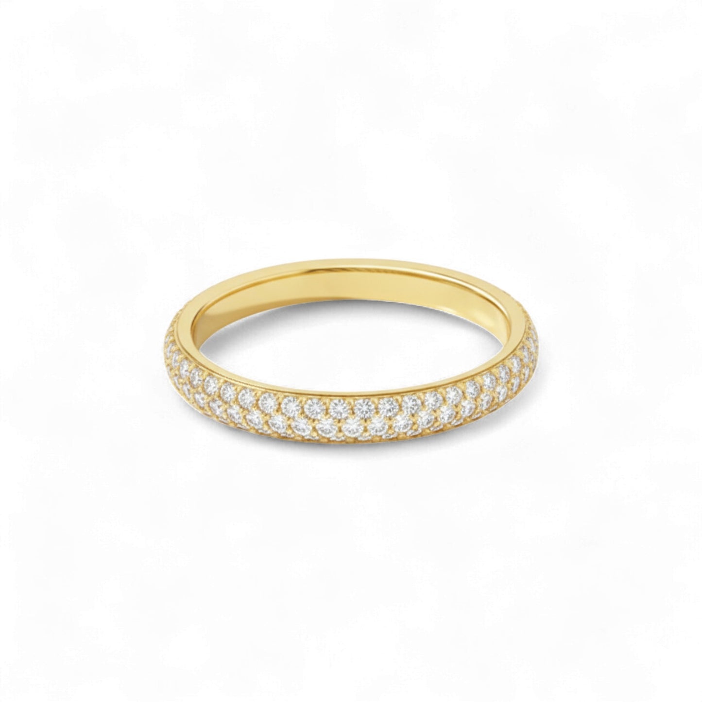 Gold ring with embedded diamonds on a white background