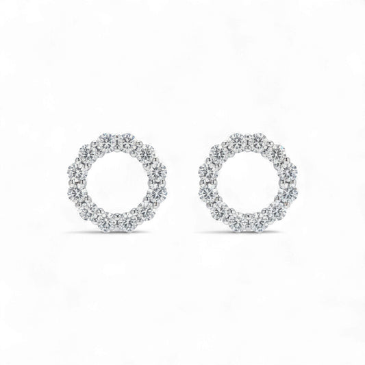 Pair of silver hoop earrings on a white background