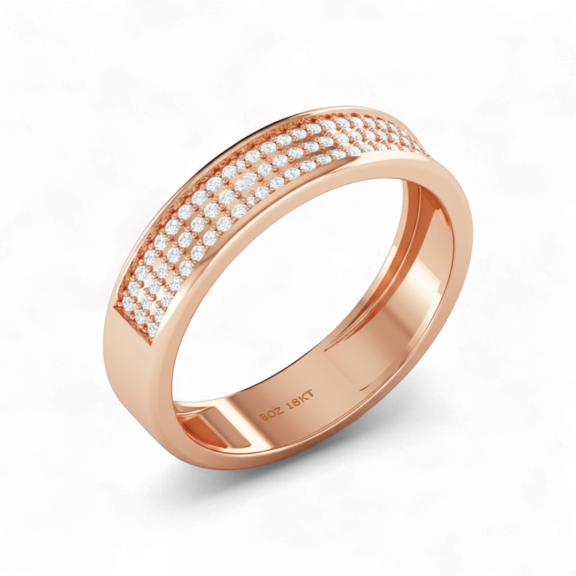 Rose gold ring with diamond accents on a white background