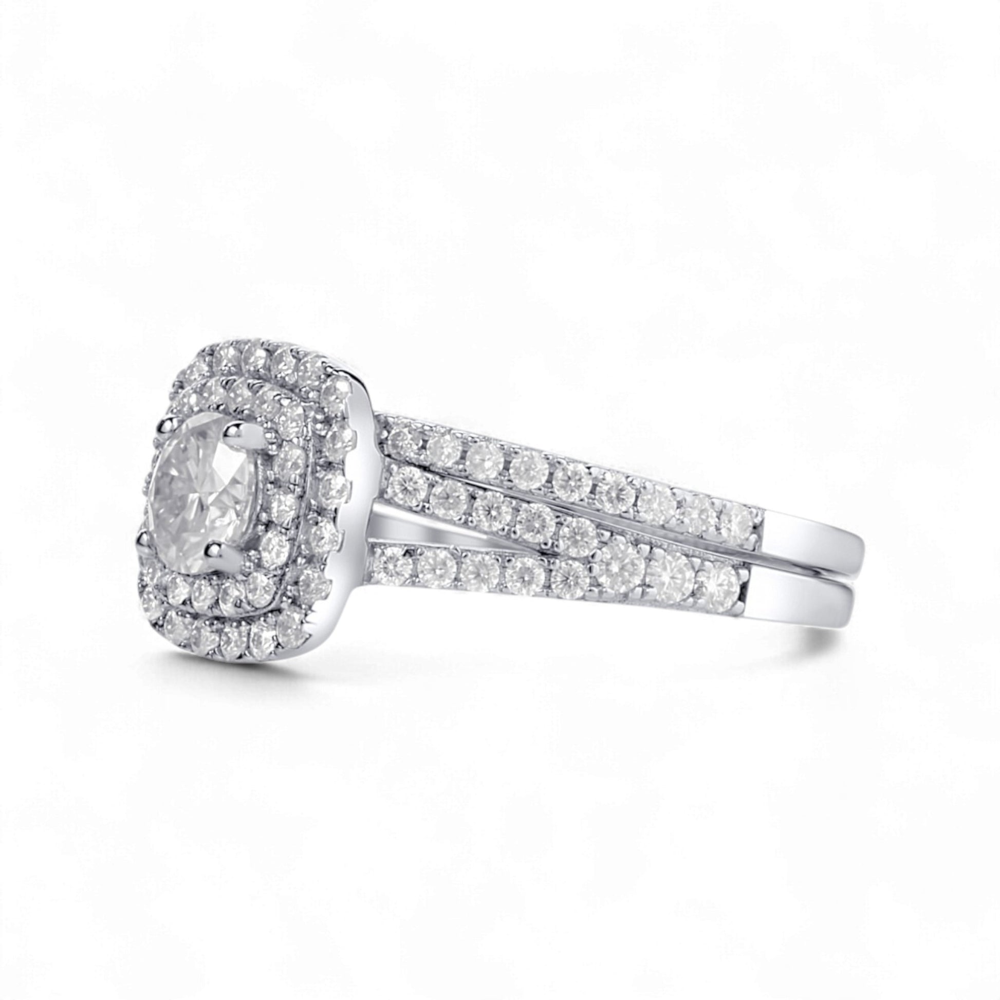 Silver ring with diamond accents on a white background
