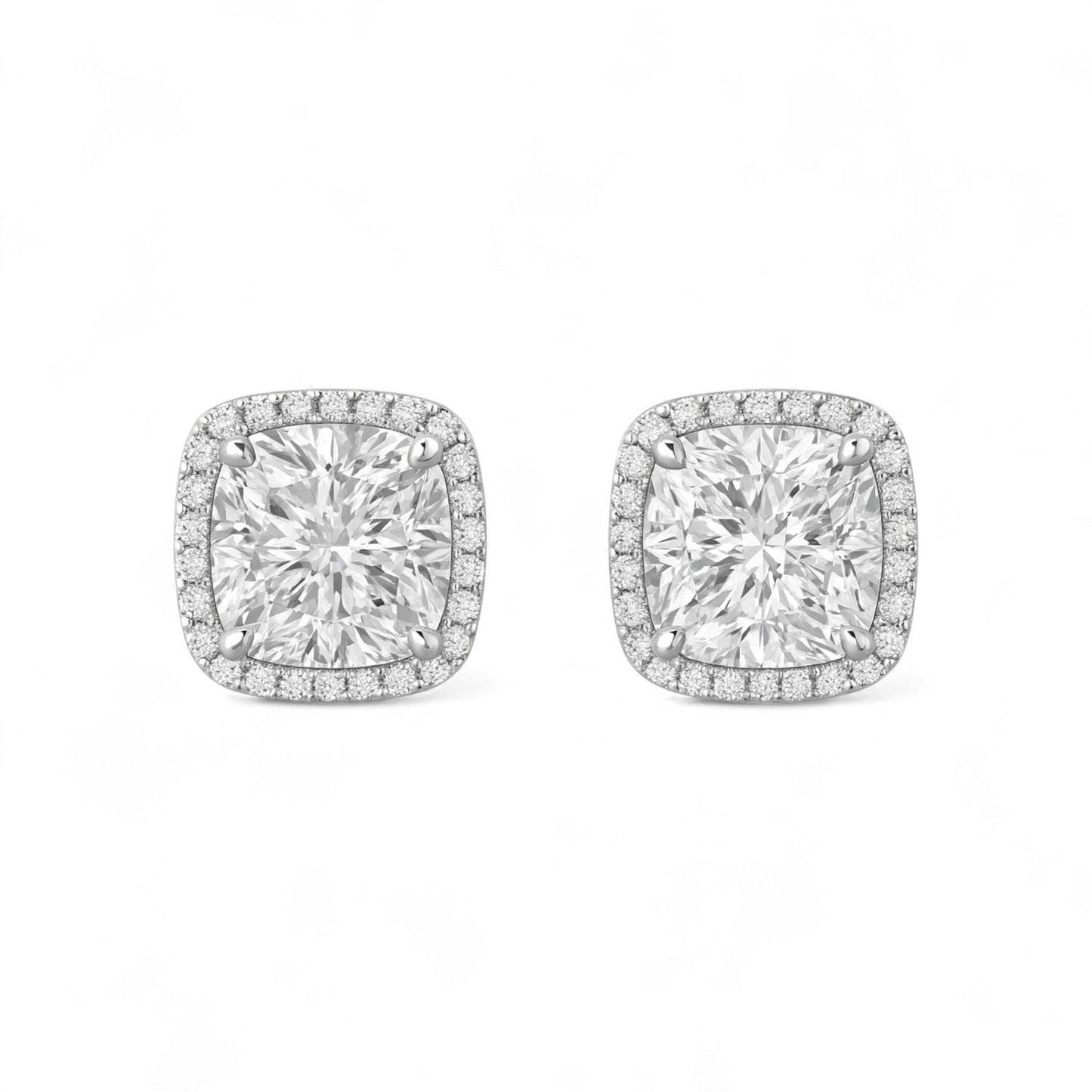 Pair of diamond earrings on a white background