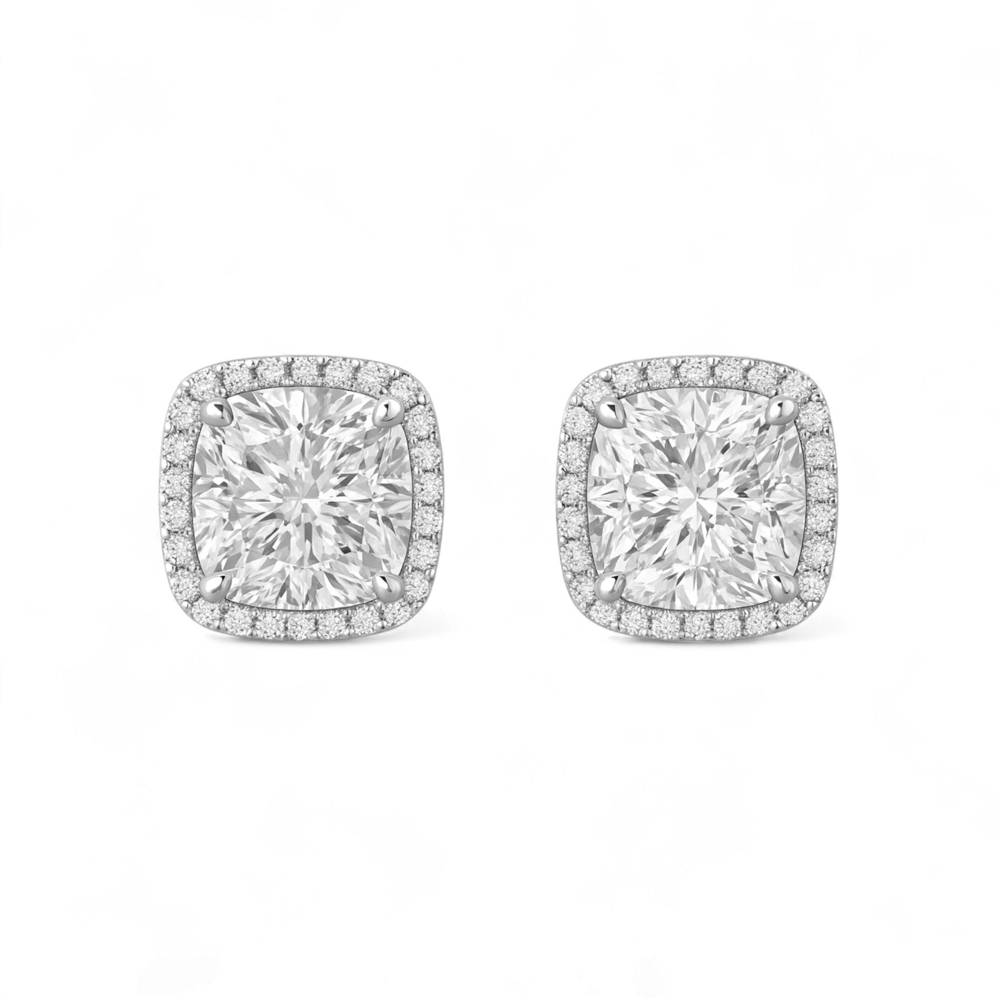 Pair of diamond earrings on a white background