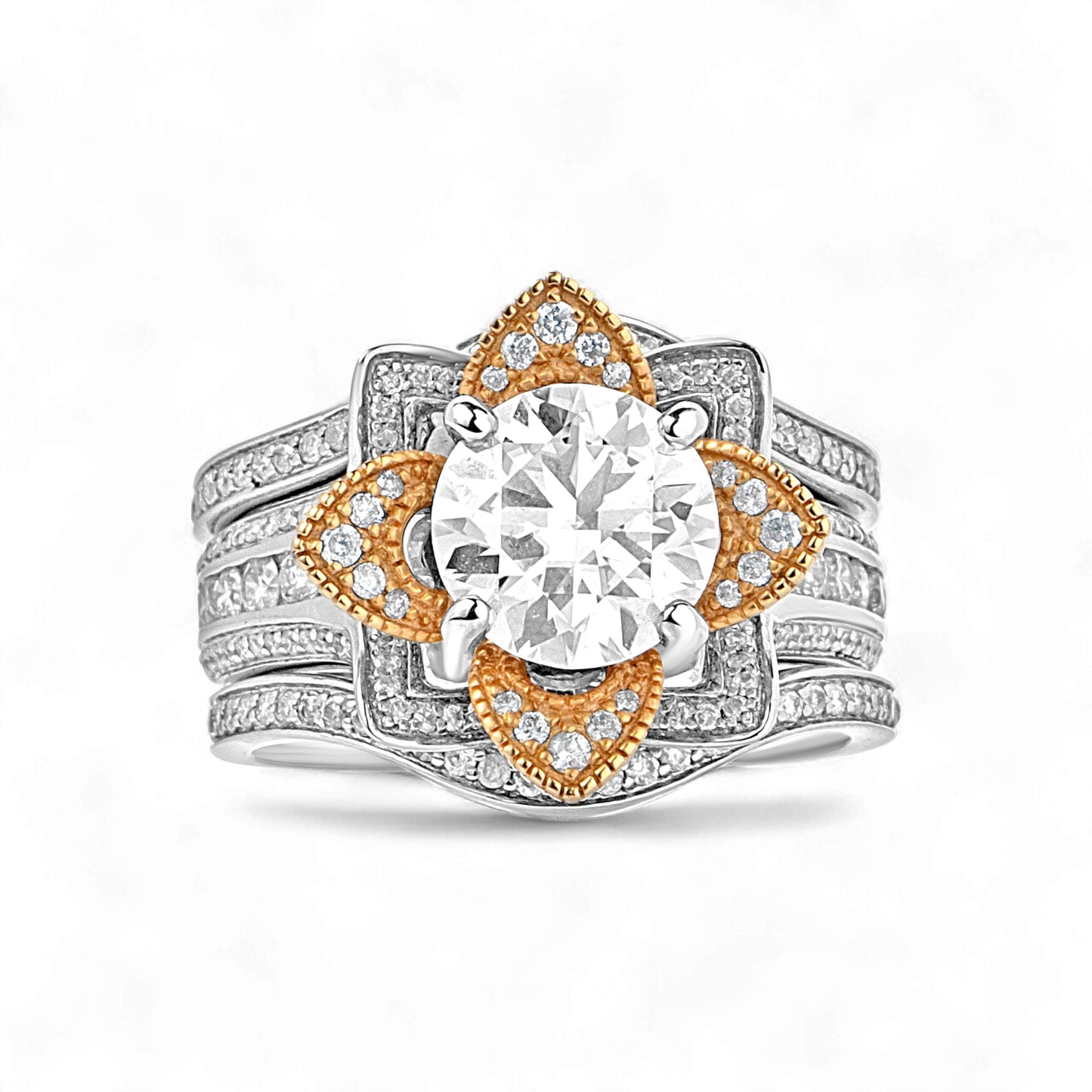 Diamond ring with gold and silver design on a white background