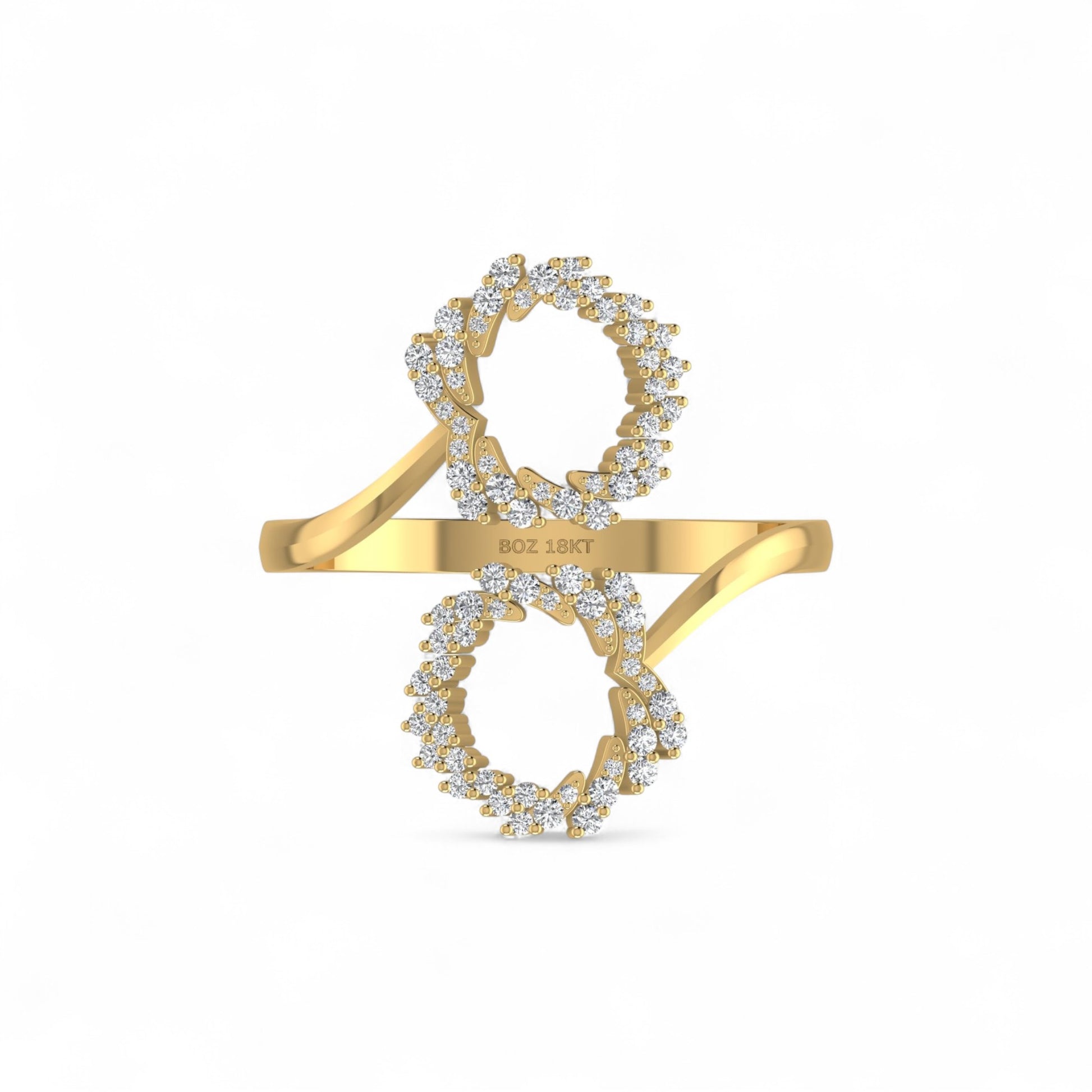 Gold ring with diamond accents on a white background