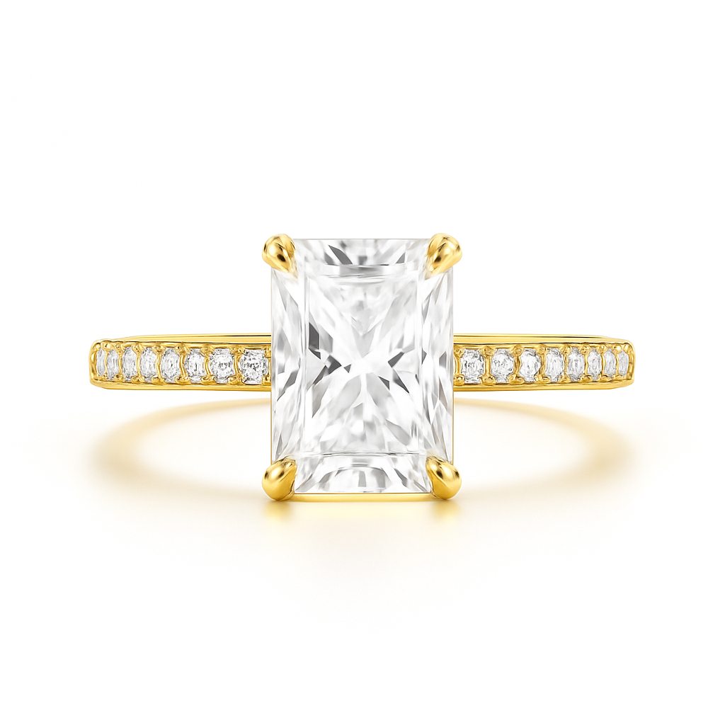 Gold ring with a large rectangular diamond and smaller diamonds on the band against a white background