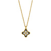 Gold necklace with a clover-shaped pendant on a white background
