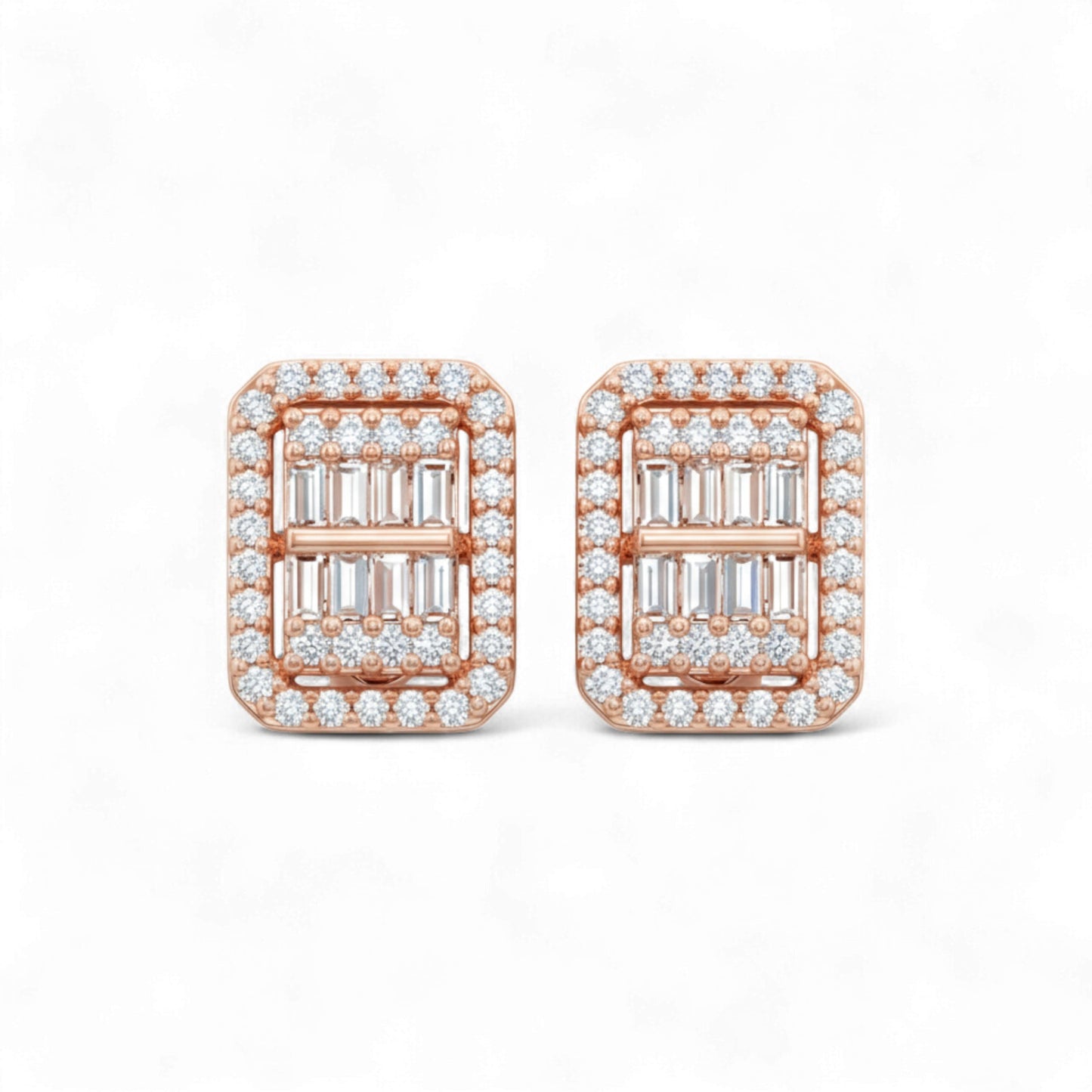Rose gold earrings with emerald-cut gemstones and diamond accents on a white background