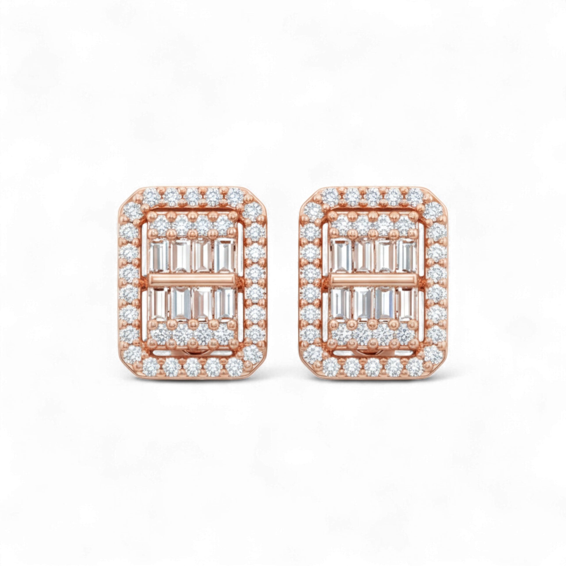 Rose gold earrings with emerald-cut gemstones and diamond accents on a white background