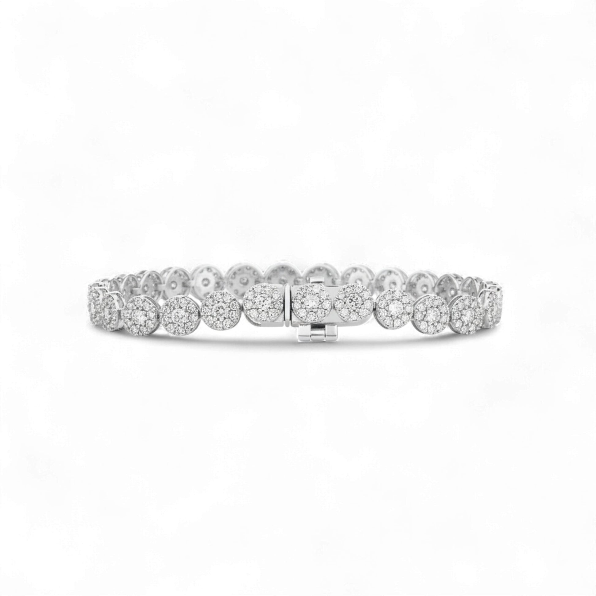 Silver bracelet with clear stones on a white background