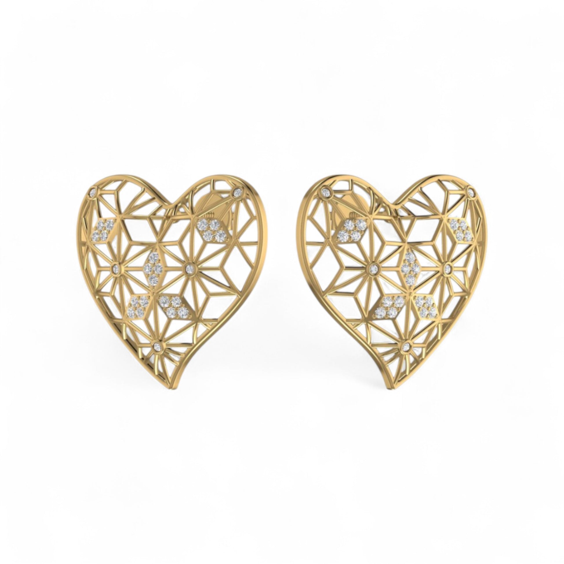 Gold heart-shaped earrings with diamond-like stones on a white background