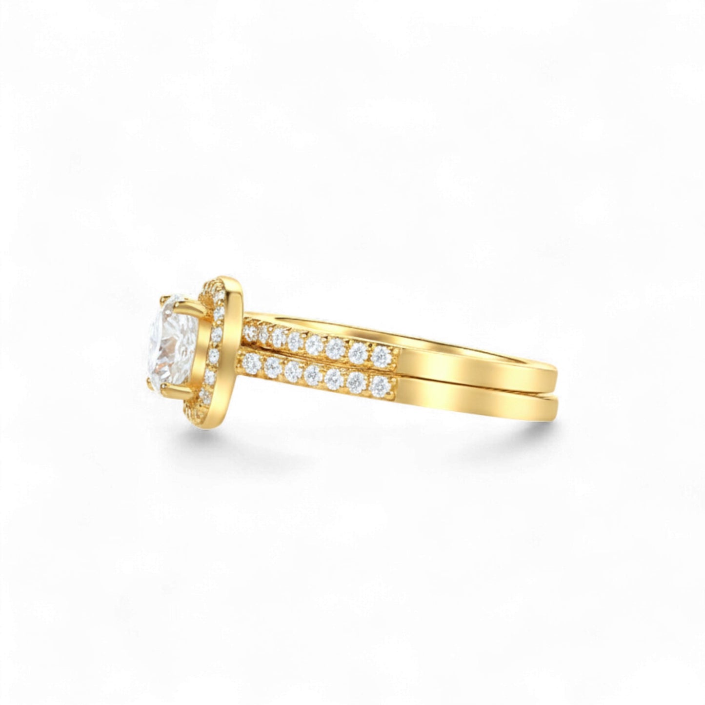 Gold ring with a diamond on a white background