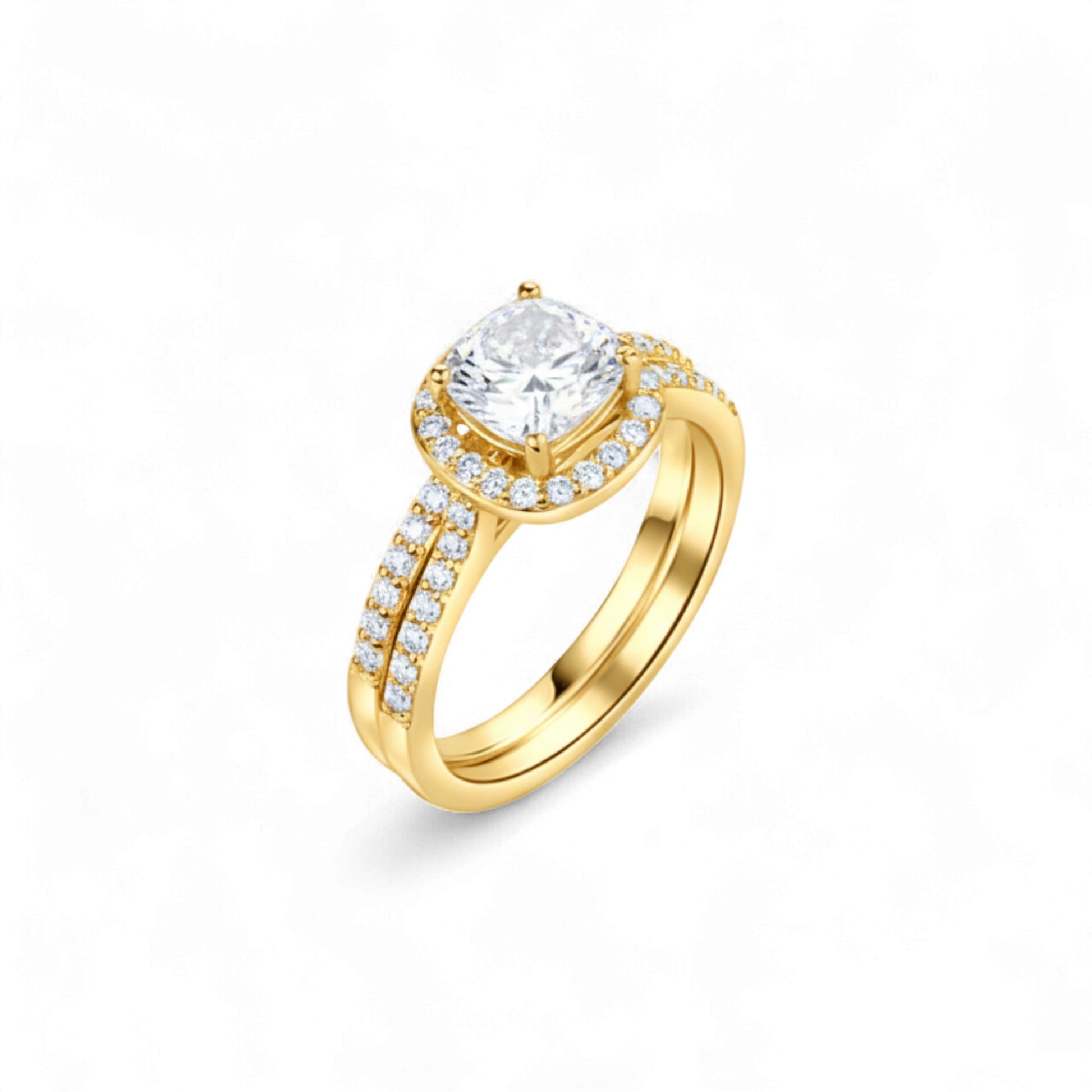 Gold ring with a large diamond and smaller diamonds on the band against a white background