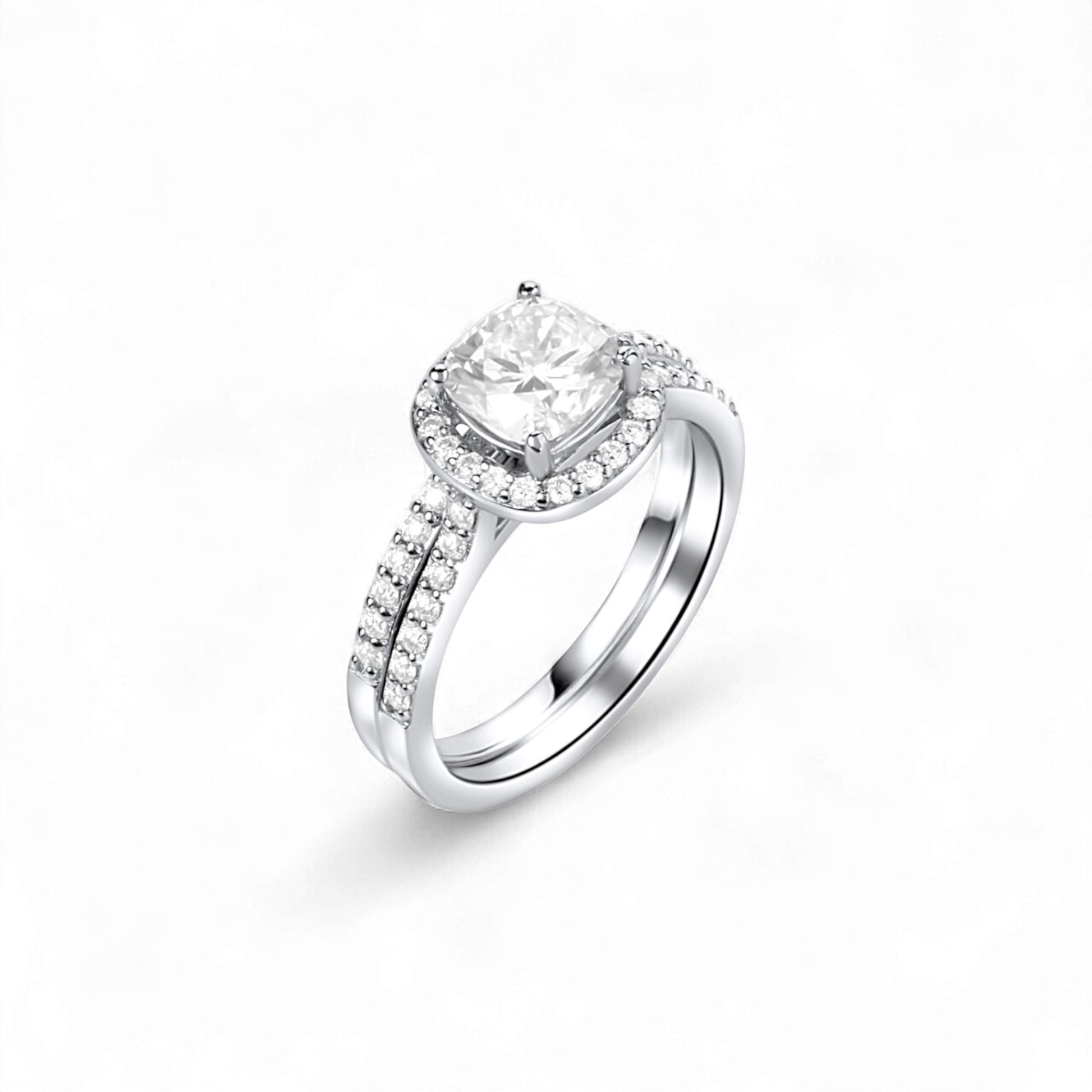 Silver ring with a diamond on a white background