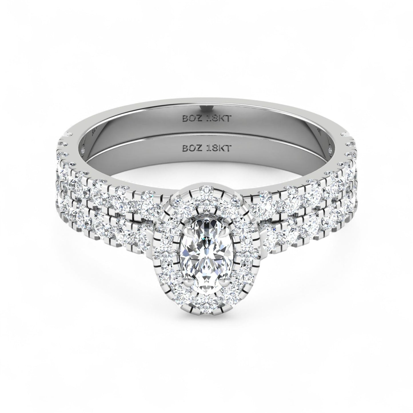 Silver ring with diamond accents on a white background