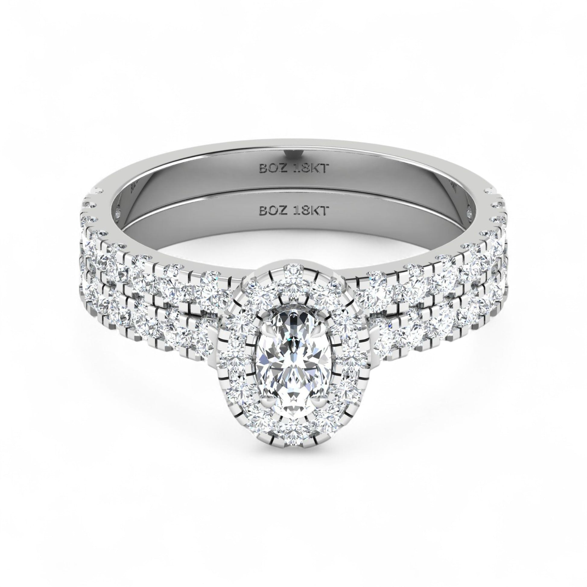 Silver ring with diamond accents on a white background