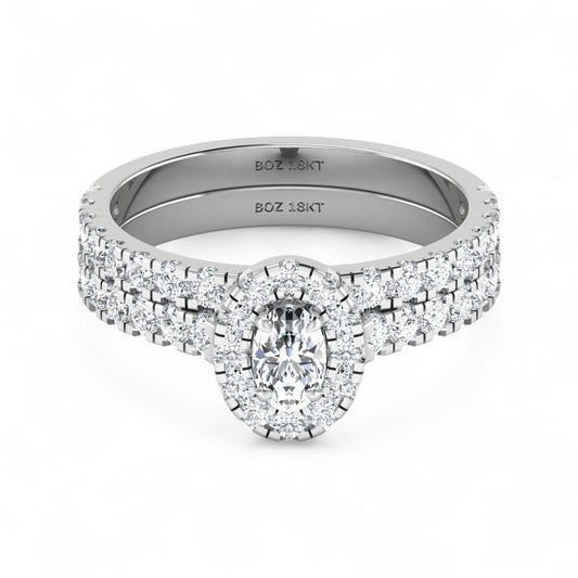 Silver ring with diamond accents on a white background