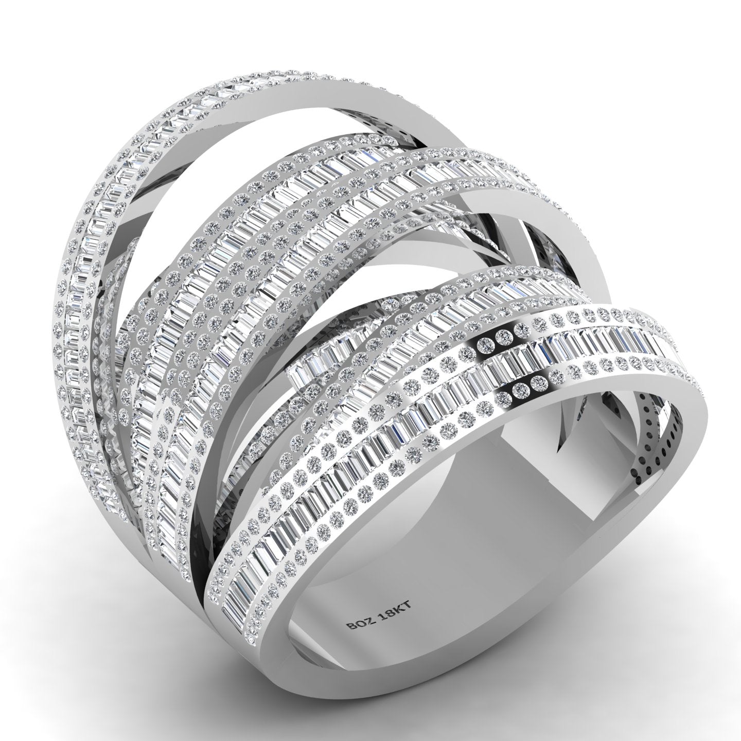 A layered crisscross baguette cut ring in 18 karat gold with natural diamonds.