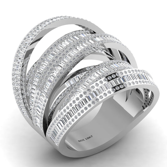 A layered crisscross baguette cut ring in 18 karat gold with natural diamonds.