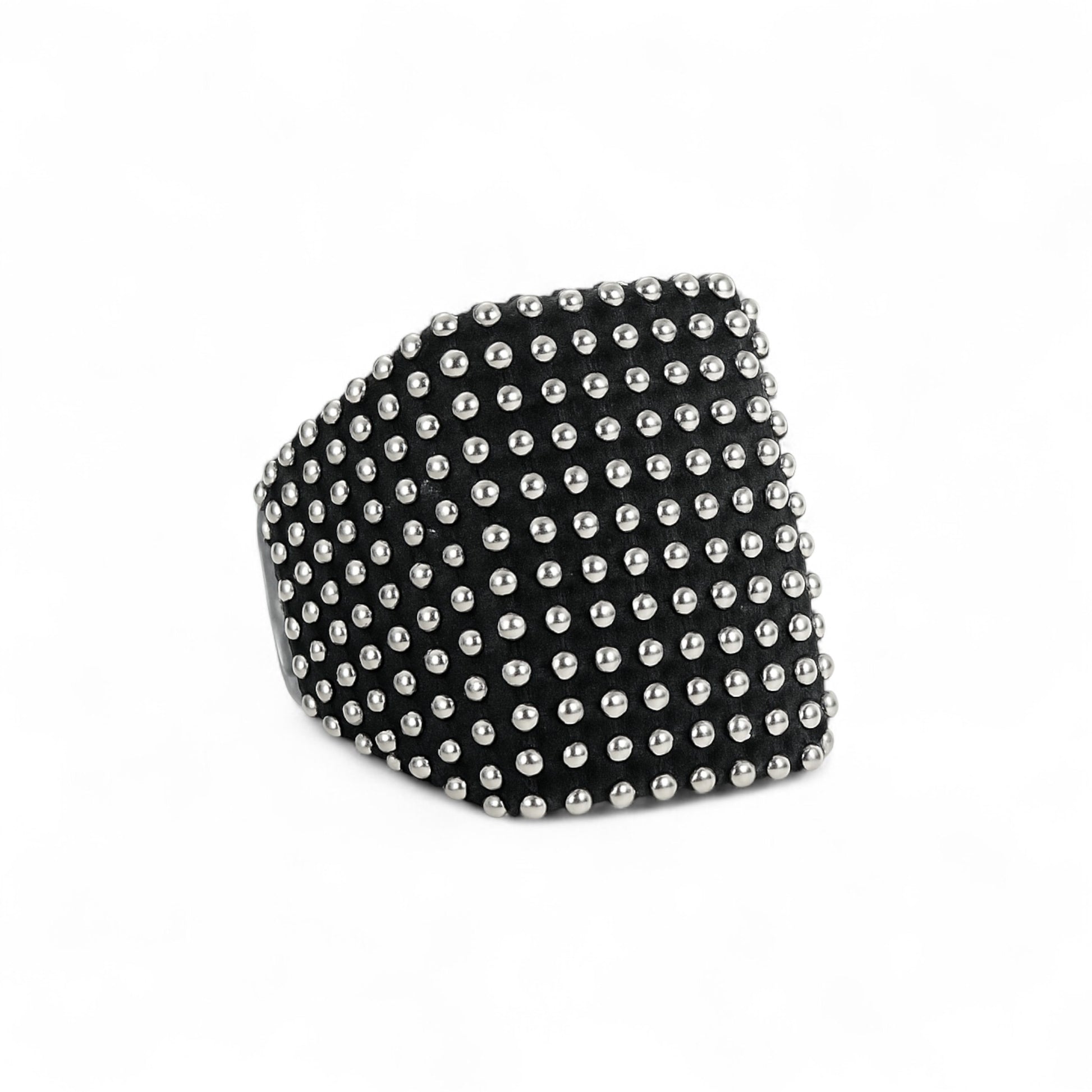 Black ring with silver studs on a white background