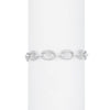 Silver bracelet with circular links on a white background