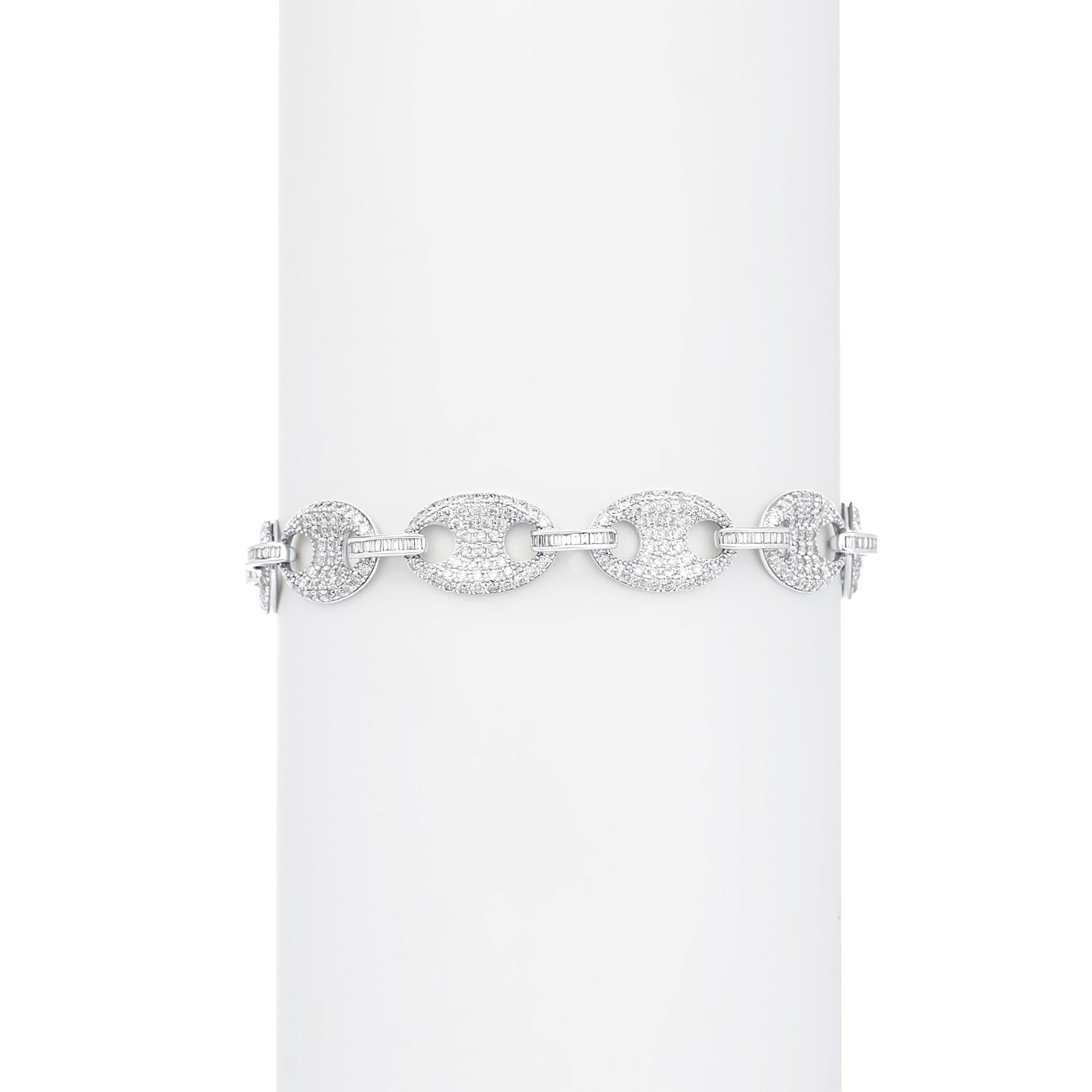 Silver bracelet with circular links on a white background