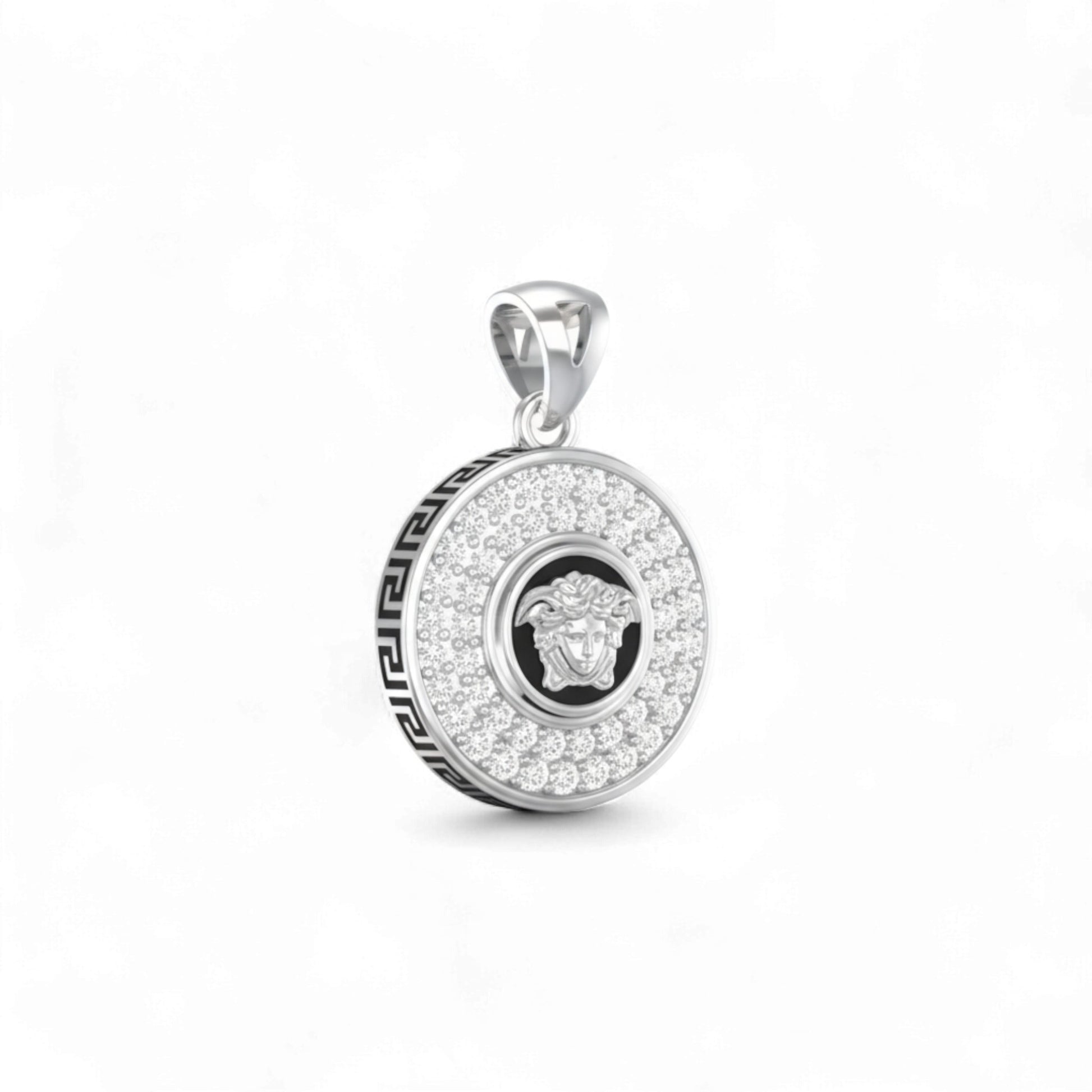 Silver pendant with gemstones on a white background