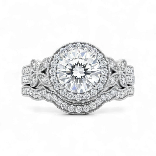 Elegant diamond ring with intricate design on a white background