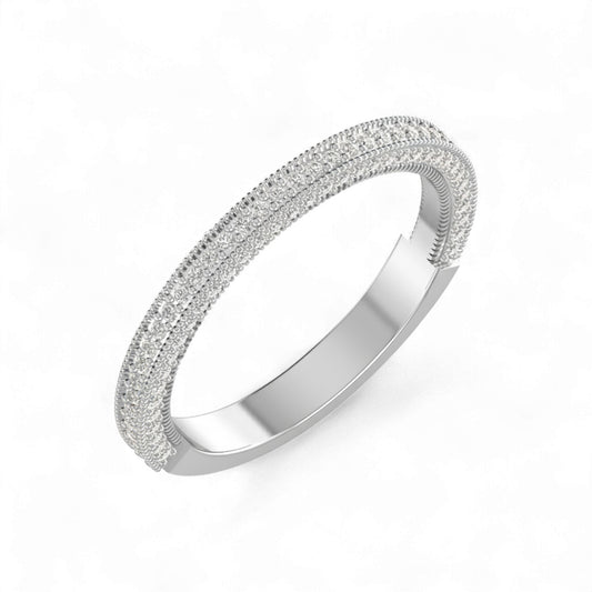 Silver ring with textured band on a white background