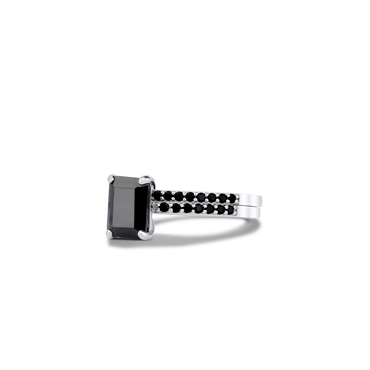 Black gemstone ring with beaded band on a white background