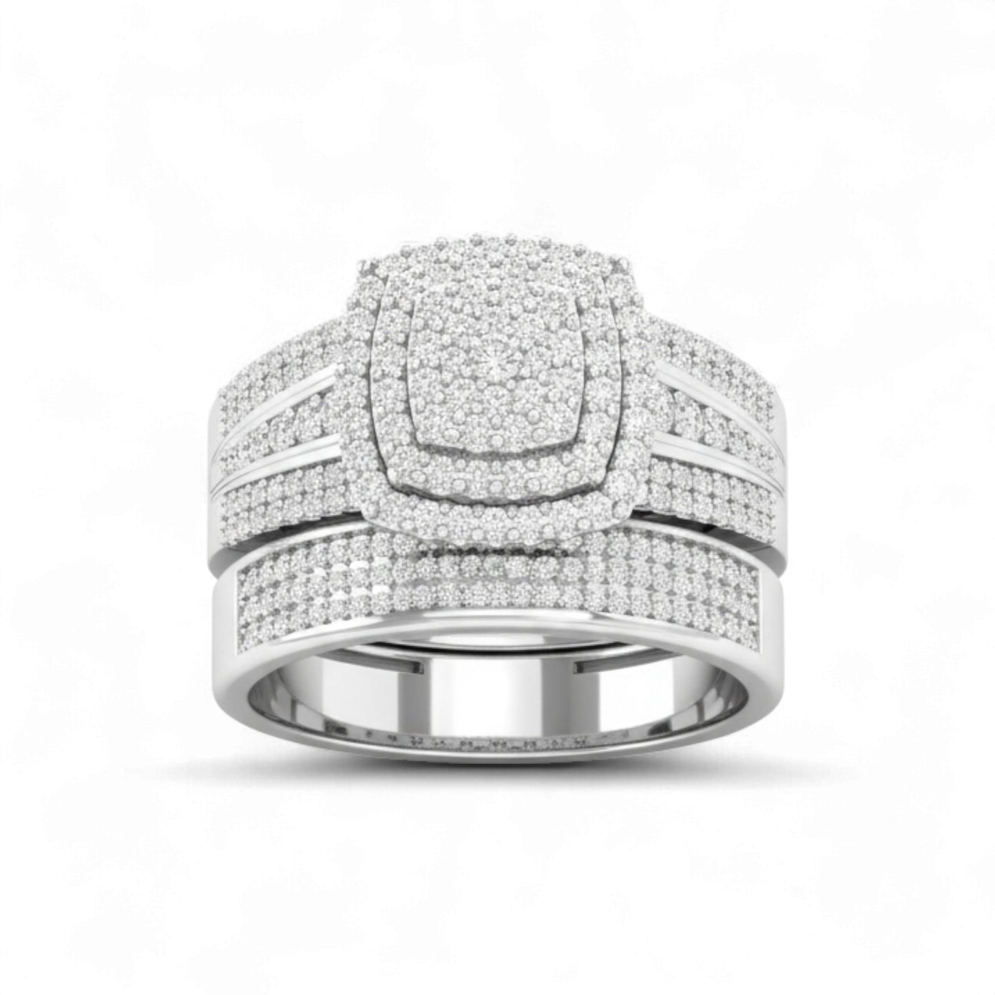 Silver ring with multiple bands and diamond accents on a white background