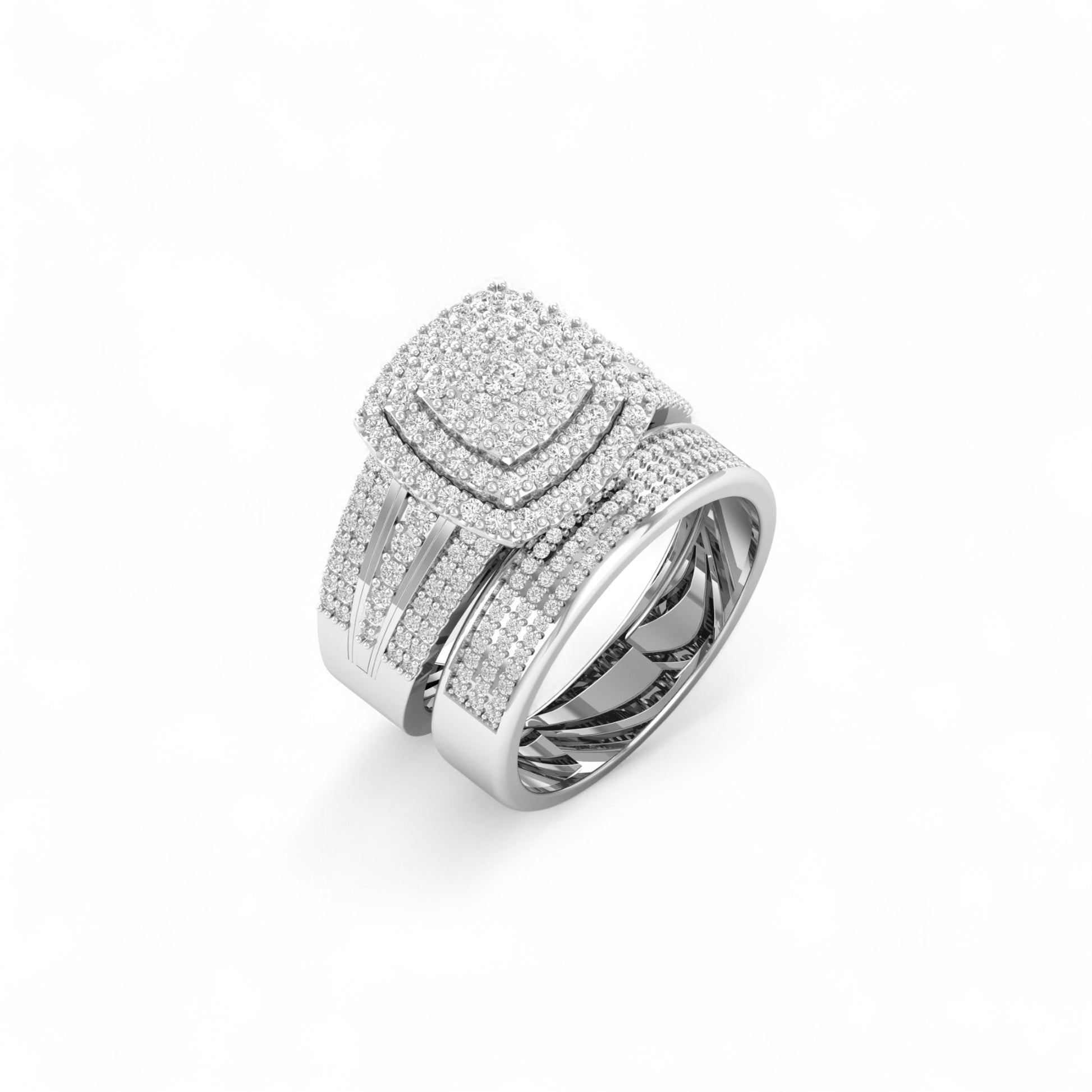 Silver ring with intricate design on a white background