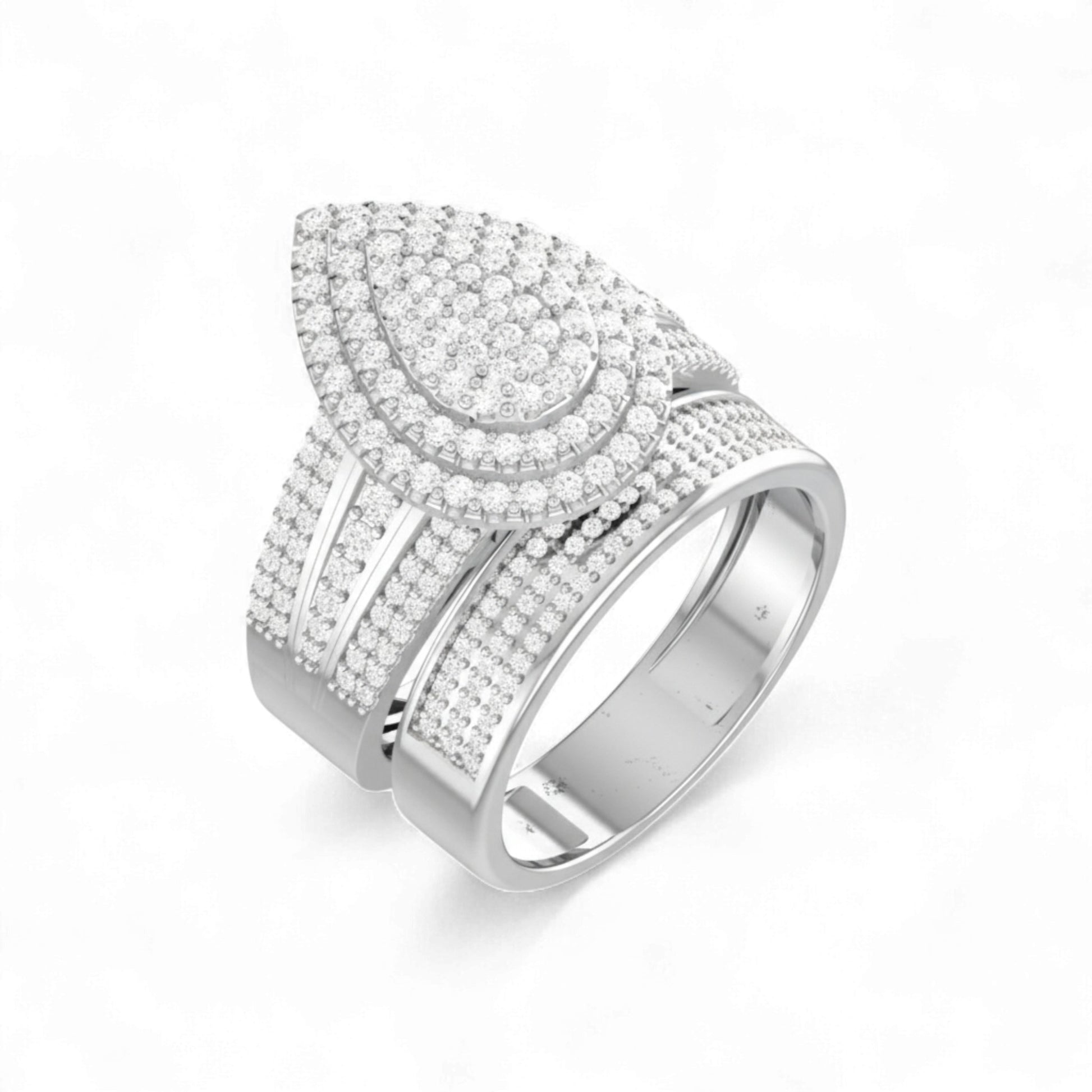 Silver ring with intricate design on a white background