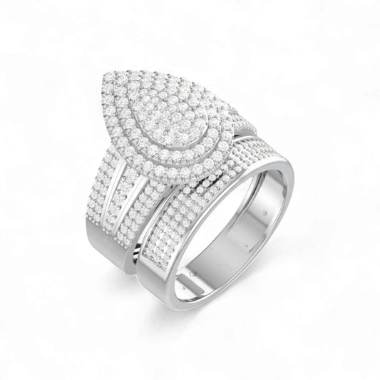Silver ring with intricate design on a white background