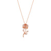 Rose gold rose-shaped pendant necklace on a white background