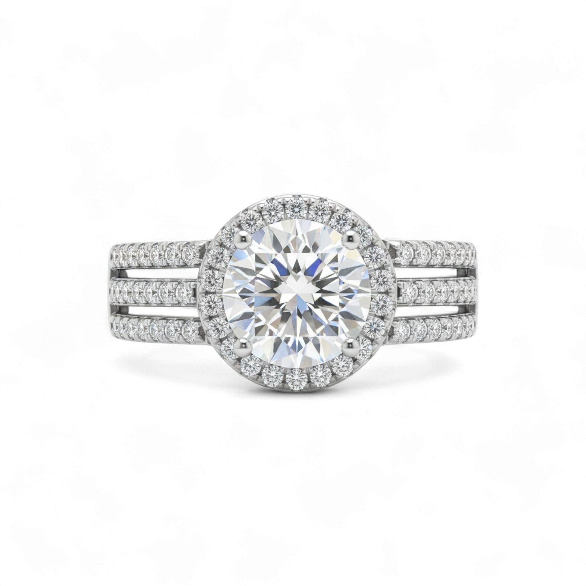Diamond ring with a halo and side stones on a white background