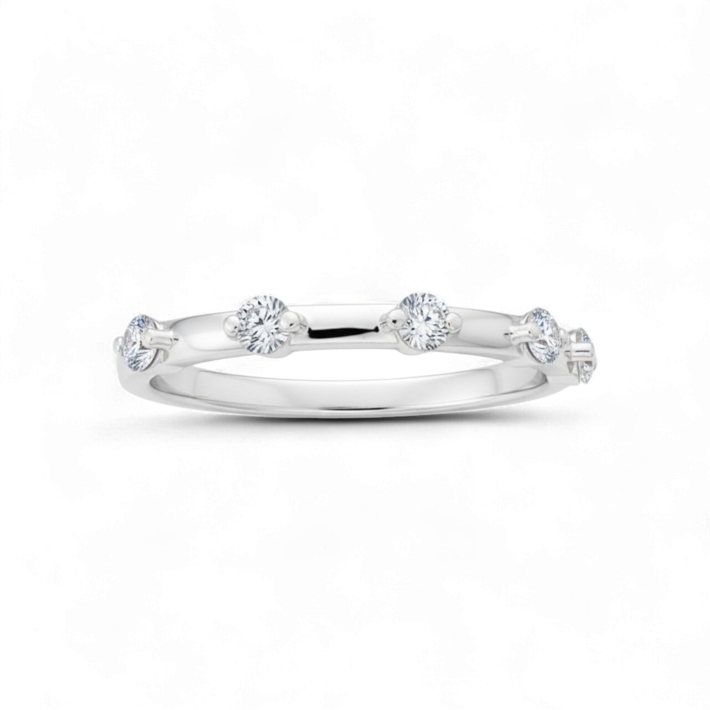 Silver ring with small diamonds on a white background