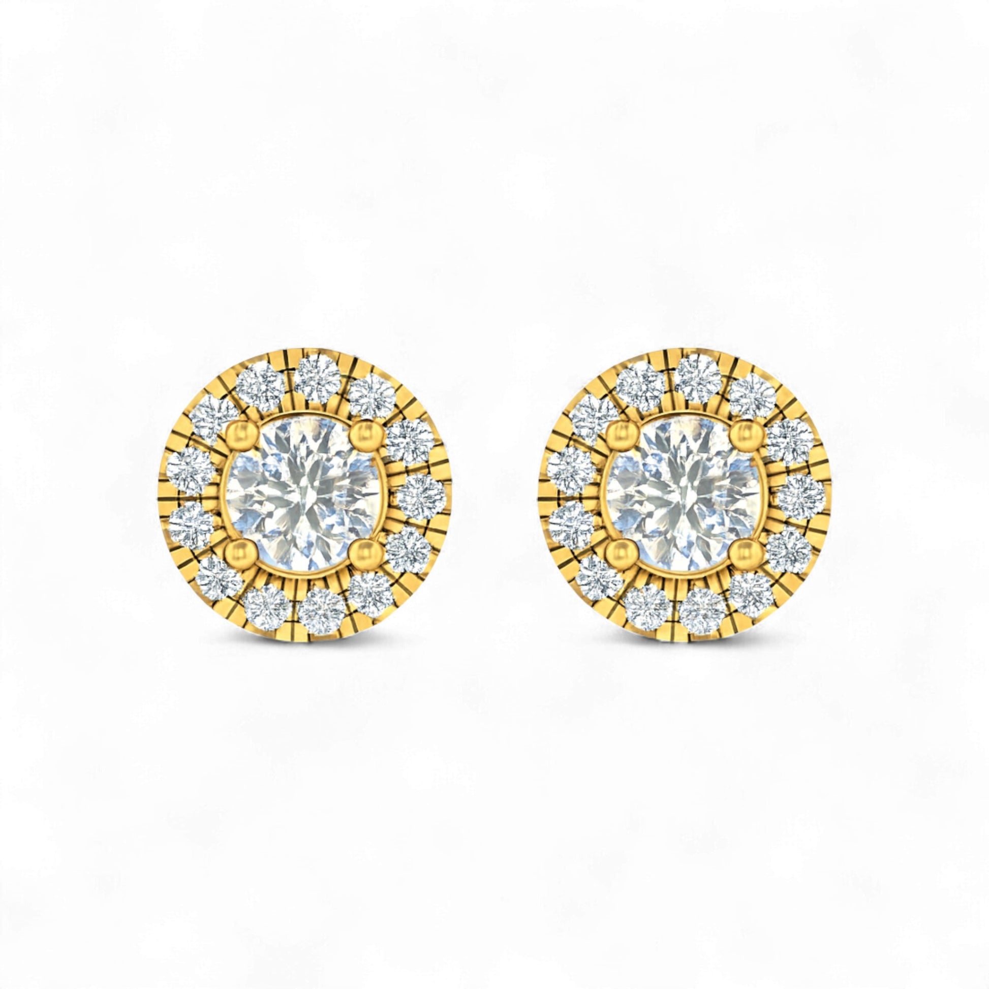 Gold and diamond earrings on a white background