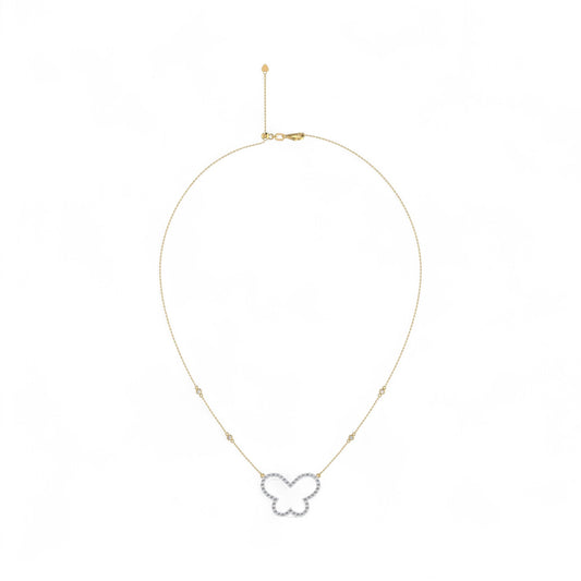 Butterfly-shaped pendant on a gold chain against a white background