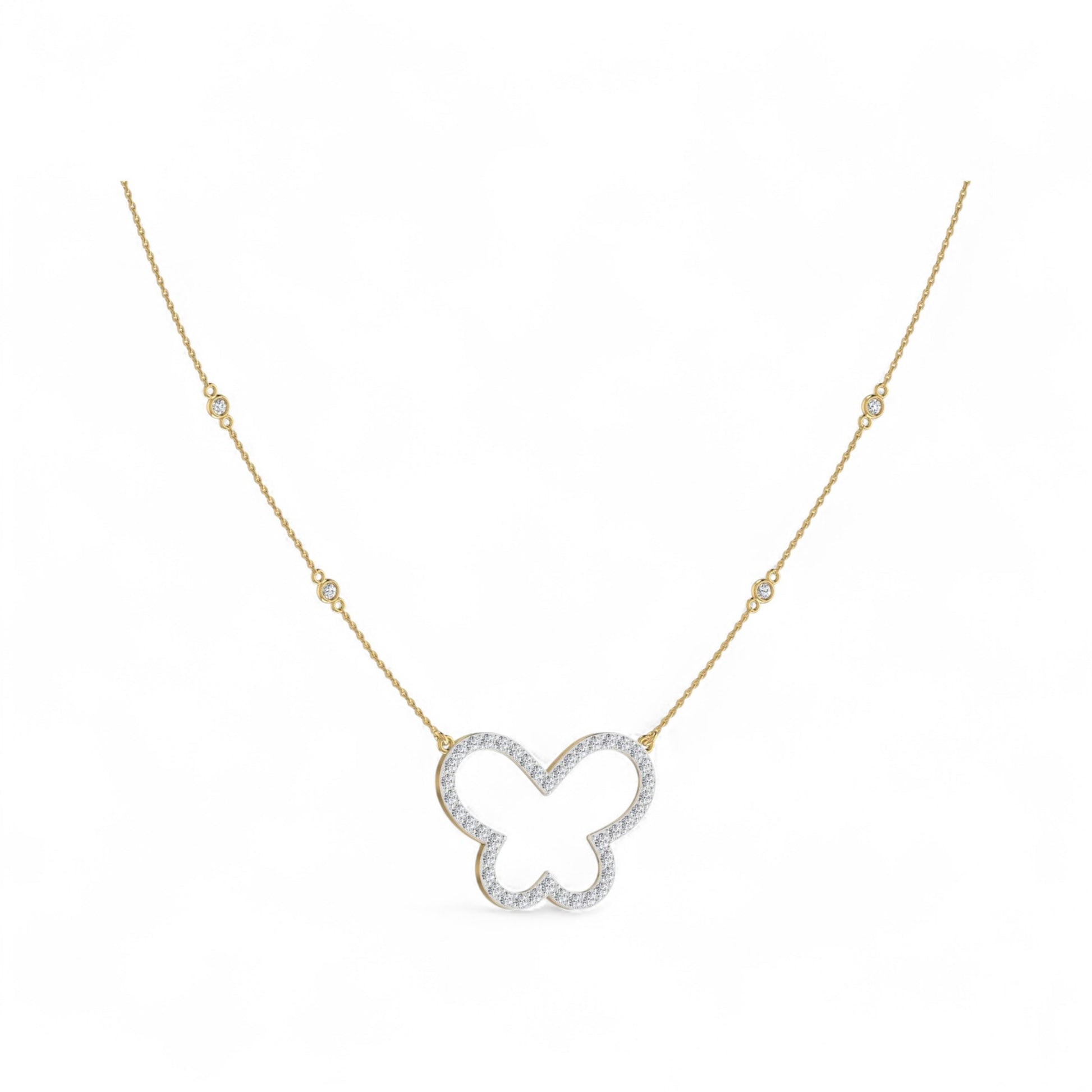 Butterfly-shaped diamond necklace on a gold chain against a white background