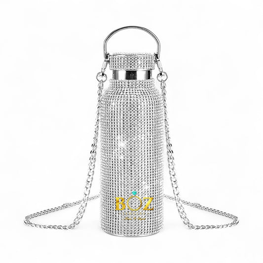 Silver rhinestone handbag with a chain strap on a white background
