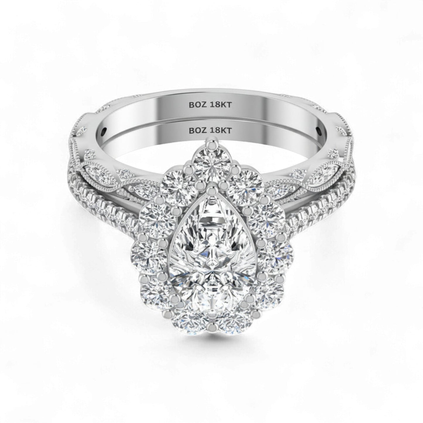 Silver ring with a pear-shaped diamond on a white background