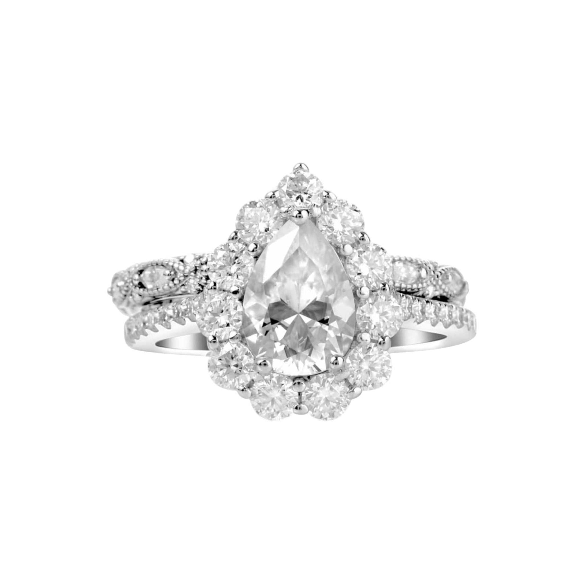 BOZ Lavie Pear Cut Moissanite bride set in 925 sterling silver with pear-shaped center stone and halo of moissanite gems