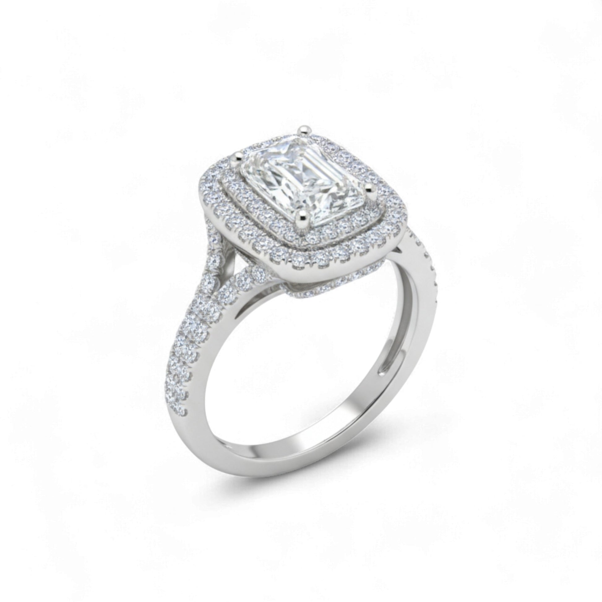 Diamond ring with a rectangular center stone on a white background