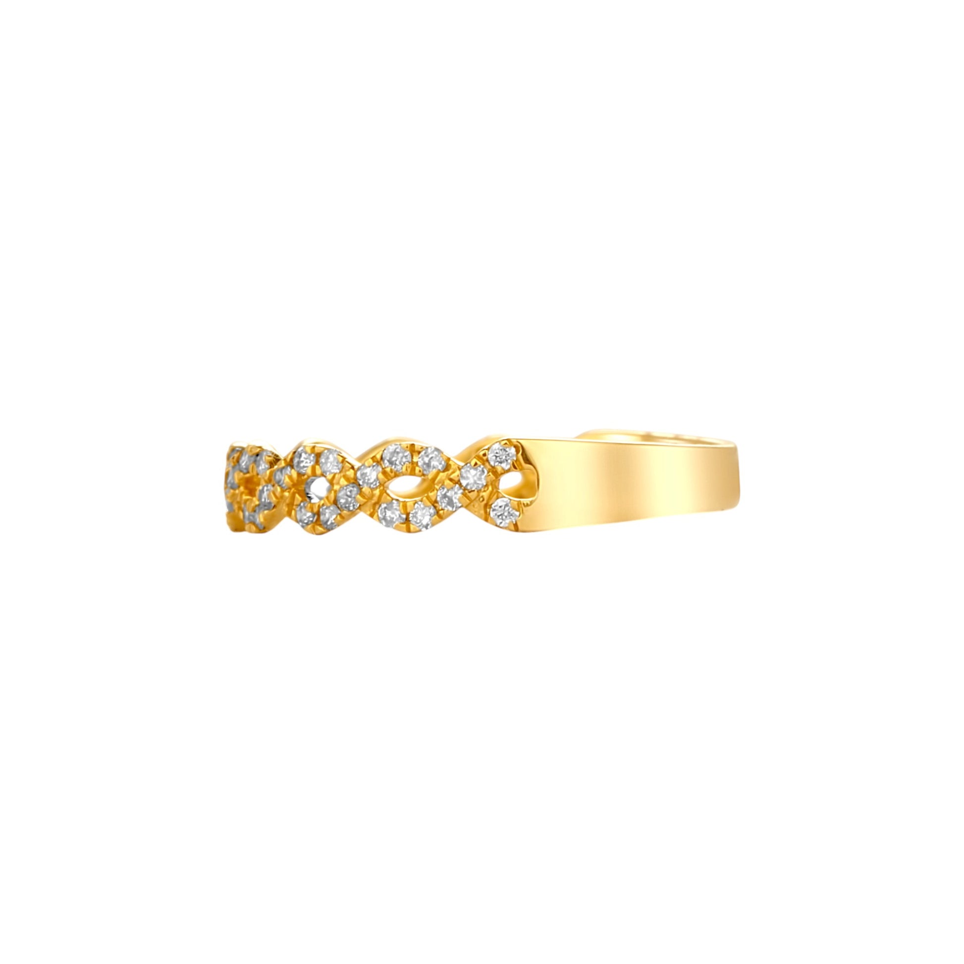 Gold ring with diamond accents on a white background