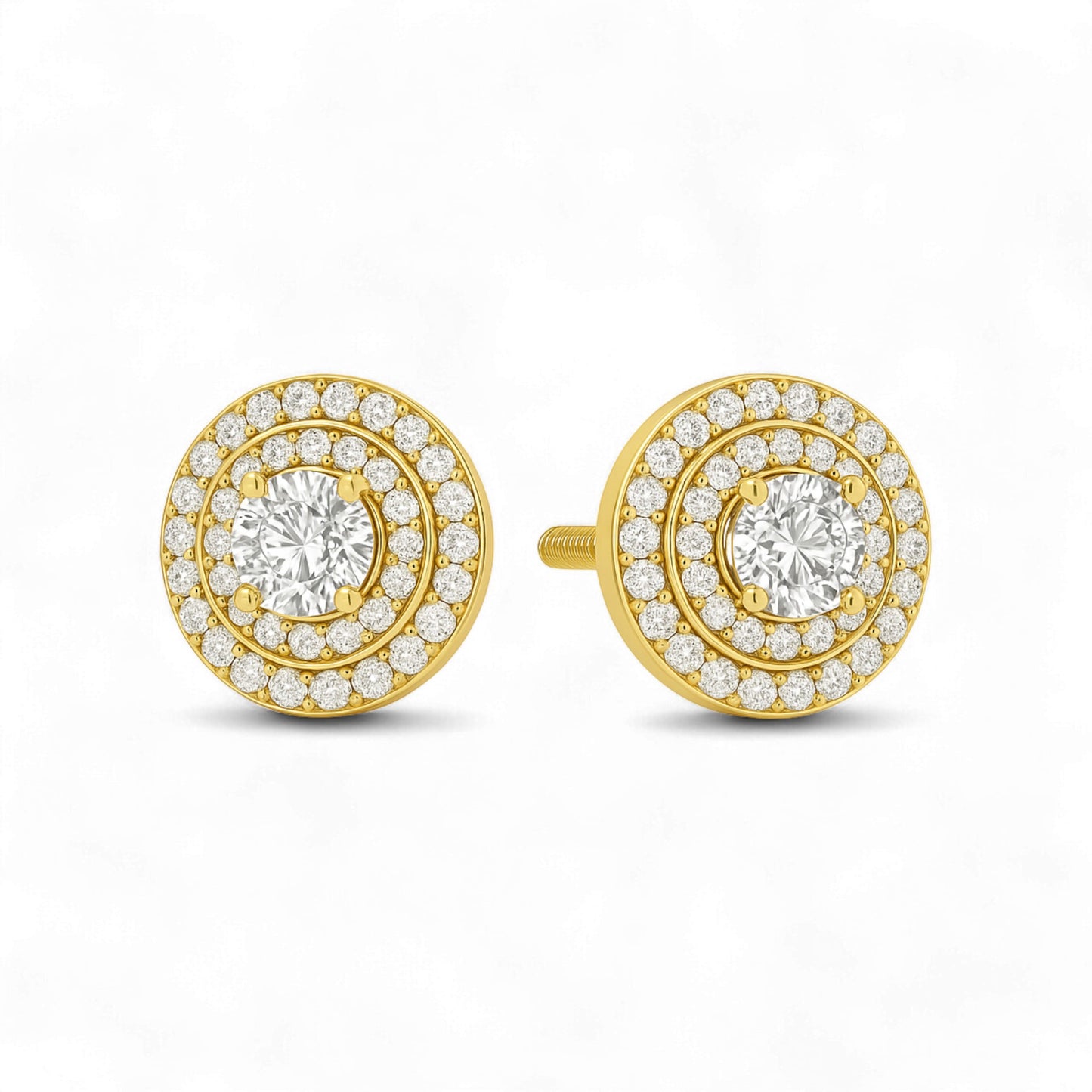 Gold and diamond earrings on a white background