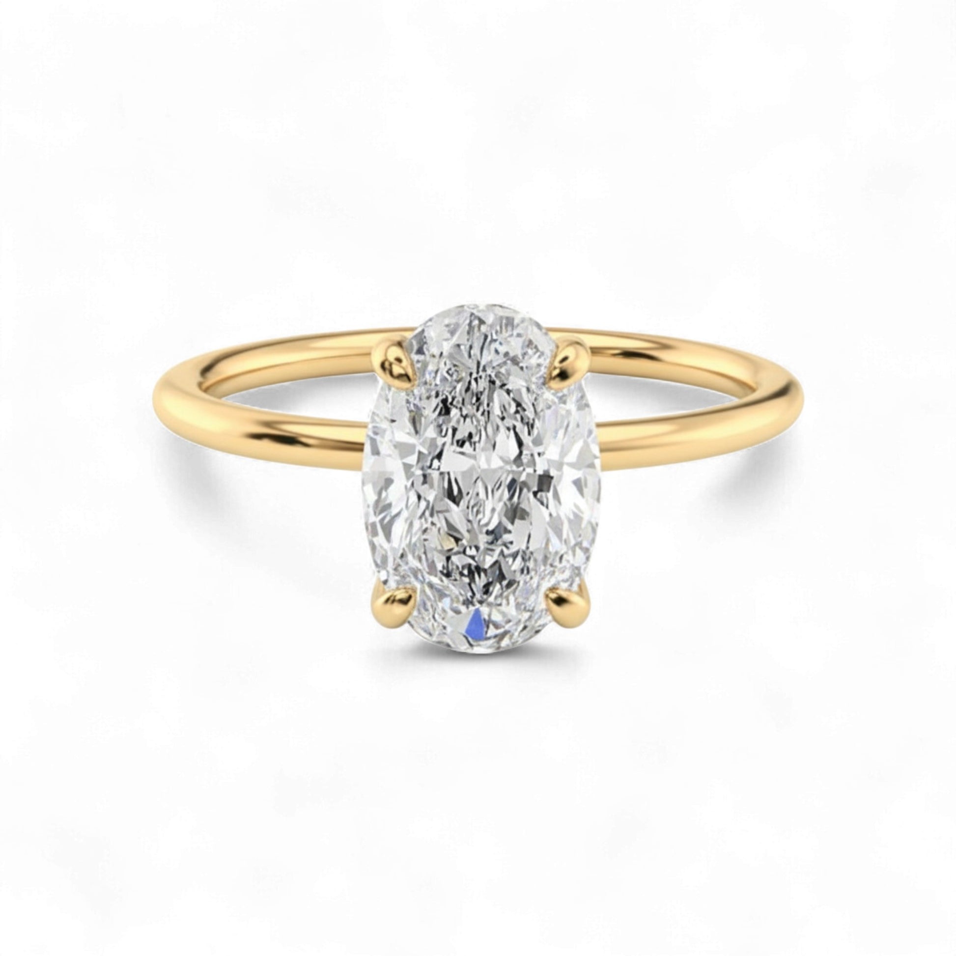 Gold ring with a large diamond on a white background