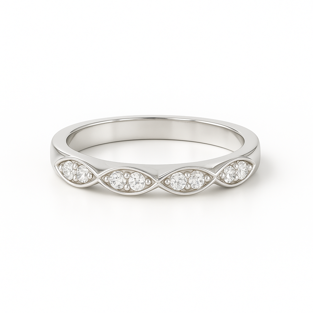 Silver ring with diamond accents on a white background